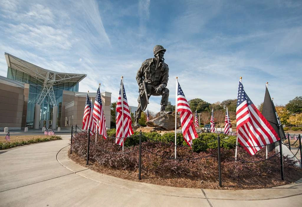 Iron Mike memorial surrounded by American flags